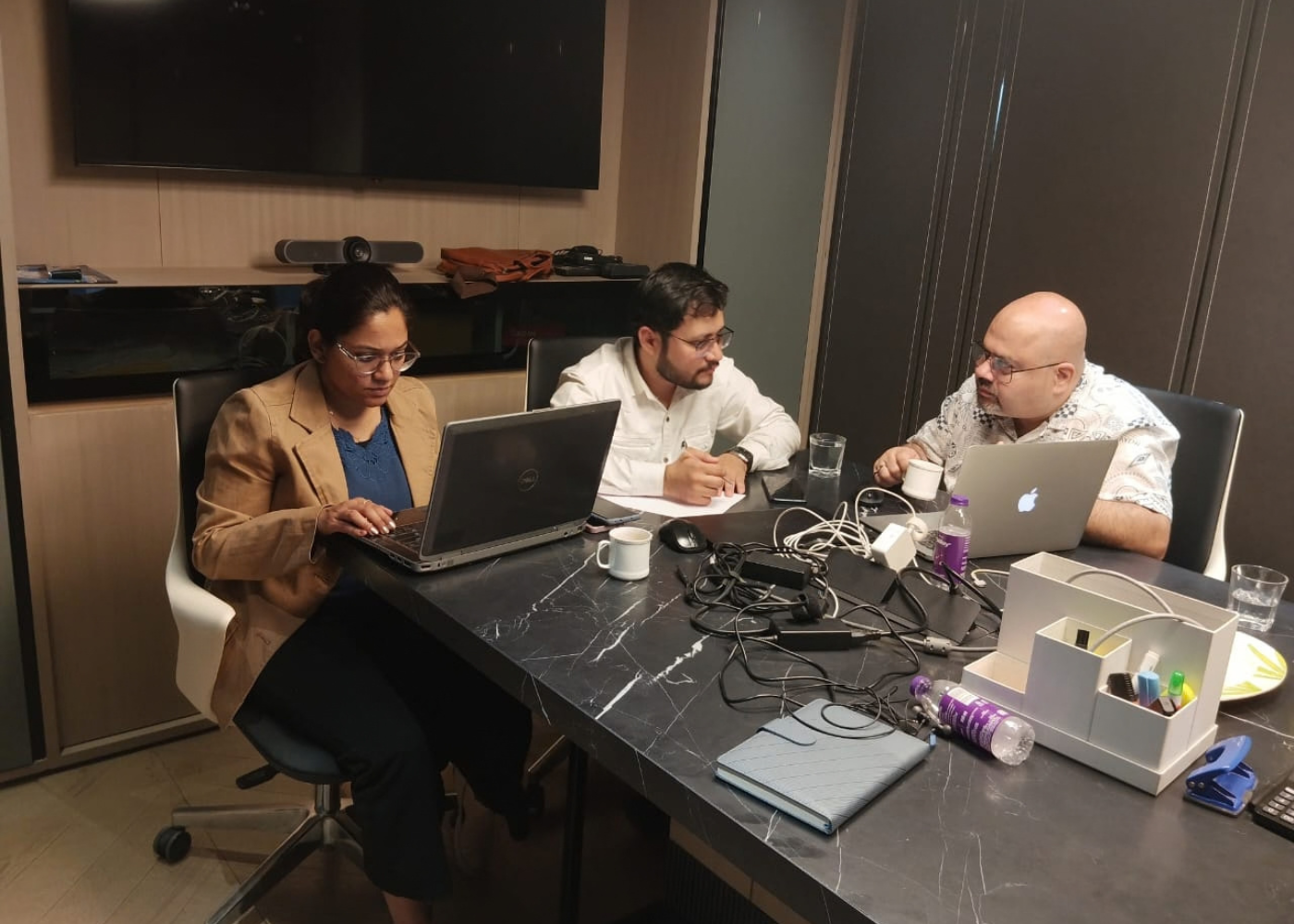 Architects and interior designers discussing a project, representing digital marketing services for design studios